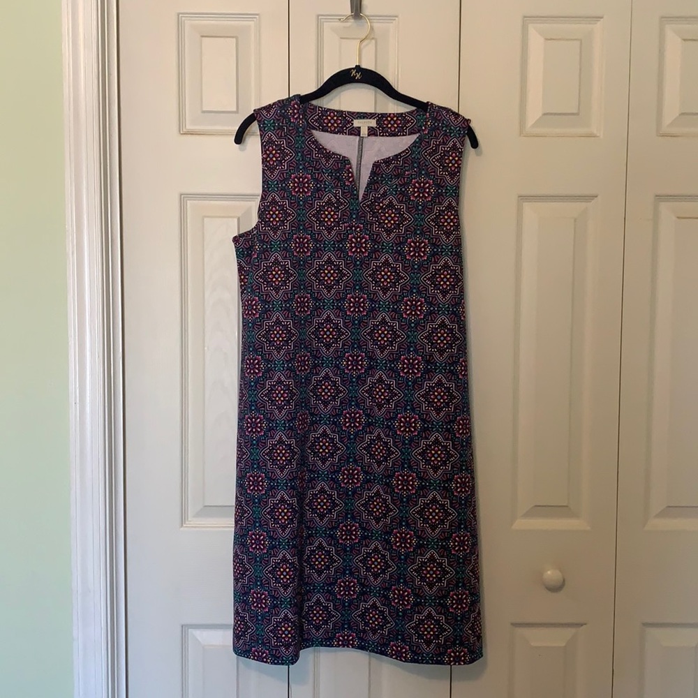 Tank dress with a V-neck accent.